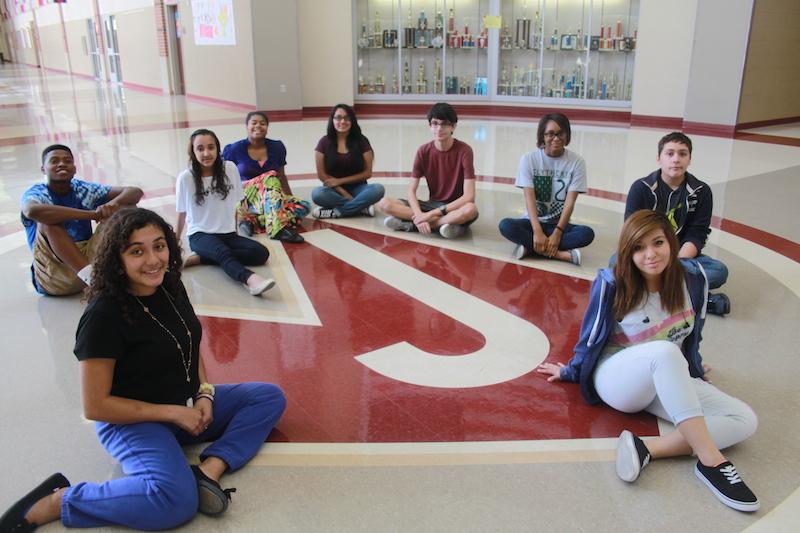 The first group of staff members of The Fuel pose in front of the Diamond J. Judson High School launched its first online newspaper during the 2014-2015 school year.