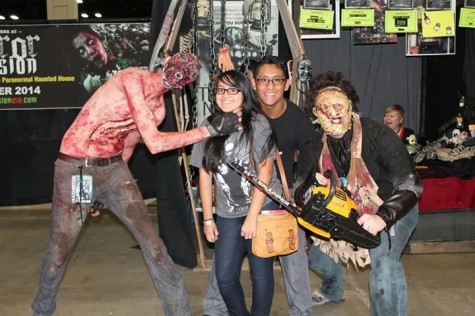Staff writer Emilee Rodriguez poses with horror characters at Alamo City Comic Con.