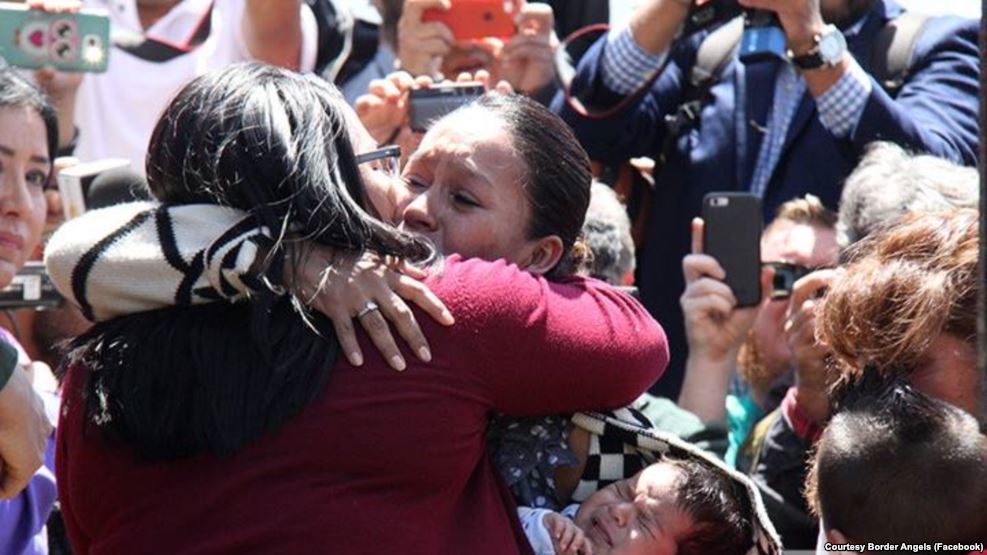 U.S. Customs and Border Patrol agents along with Rep. Juan Vargas open an emergency door at the U.S.-Mexico border in California during an event where immigrant families were able to spend three minutes together. ... The first time was in 2013, when one family could reunite for only two minutes