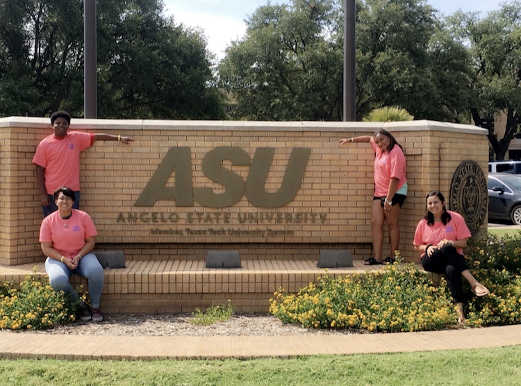 The student council officers pose with the Angelo State University logo. They attended a leadership camp where they interacted with other school leaders to improve their programs. 