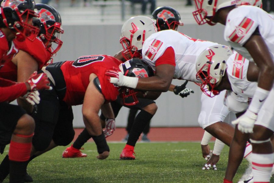 Judson defensive tackle attempts to move past the offensive line in attempts for a quick sack/tackle. Rockets win 35-27 at the annual Hammer Bowl game.