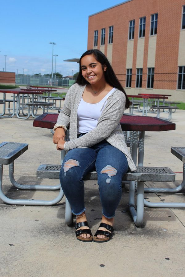 Senior Tejas Fruean shares a smile after being awarded Class President. Fruean also holds the leadership positions of Band President, Drum Major, and NHS Historian. 