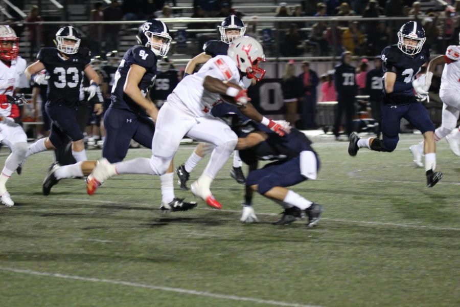 Senior Sincere McCormick shakes a Ranger defenders tackle rushing into the end zone for another touchdown. Rockets win 28-0 away at Ranger Stadium.