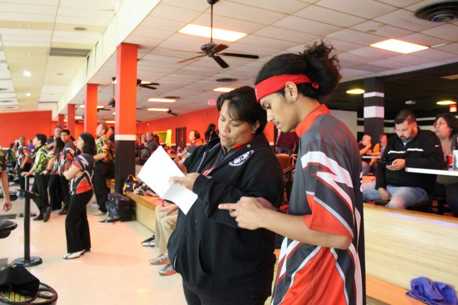 Head coach Leilani Baclaan converses with her son telling about what he did and didn’t do, as well as what to improve in his bowling skills. Due to the past few years of bowling having trouble with leadership, Baclaan has improved uniting all the teams and keeping things equal within the organization.