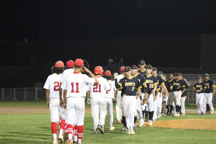 The baseball team high fives East Central after their lost. After this game, they have two more away games for the season.