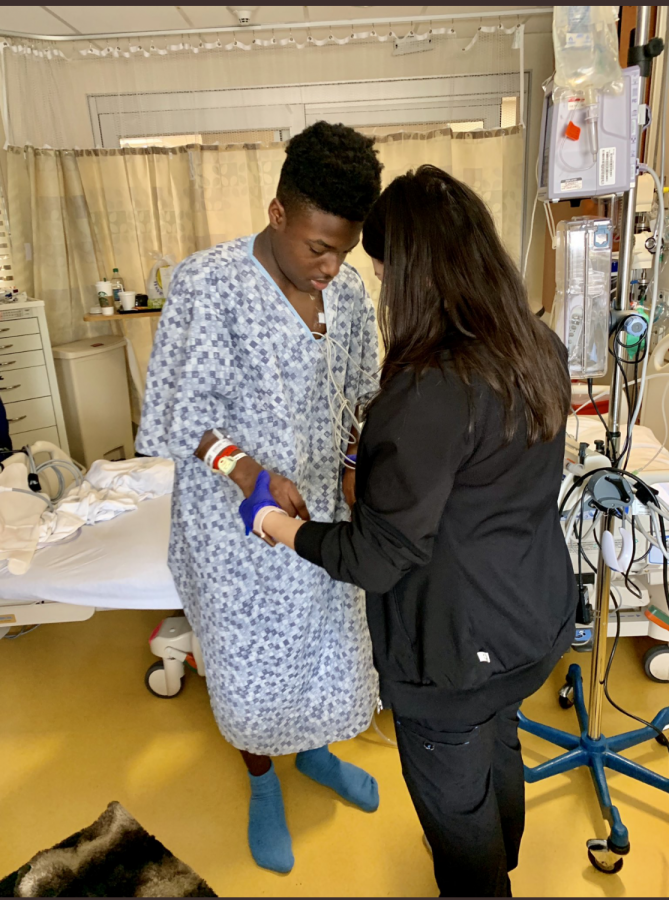 Sophomore Bryce Wisdom begins to learn how to walk again after kidney surgery. Wisdom had his kidney removed due to stage two cancer being detected.