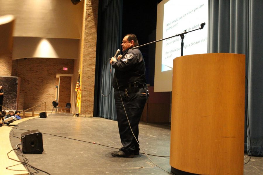 Officer Patrick Resendis speaks to freshman about how to handle police interactions.