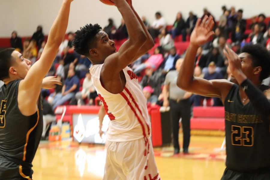 Sophomore Anariss Brandon shoots a floater into the basket during the game against East Central. The Judson Rockets won the game 81-77 and defeated the East Central Hornets in likely one of the most intense and thrilling games of the year.