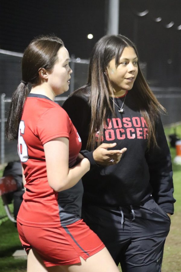 Coach Mukley coaches sophomore Leilani Kato during their game on January 24, 2019.