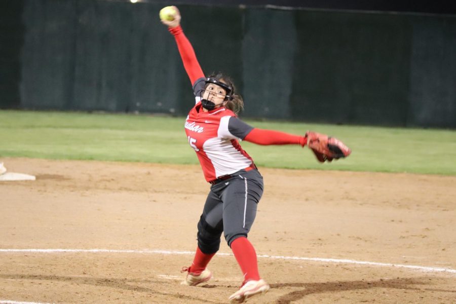 Junior Samara Sanchez pitches during the game against Reagan. Rockets beat the Rattles 10-0.