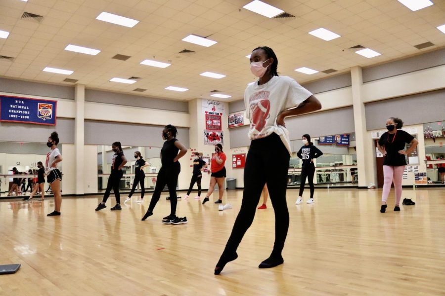Diamond Major Nylah Andrews, First Lieutenant Azilen Weeks and Colonel Mideliz Rodriguez lead the Dazzlers Pep Squad during practice on October 2. All three dance groups have to adjust to new rules set forth by UIL.