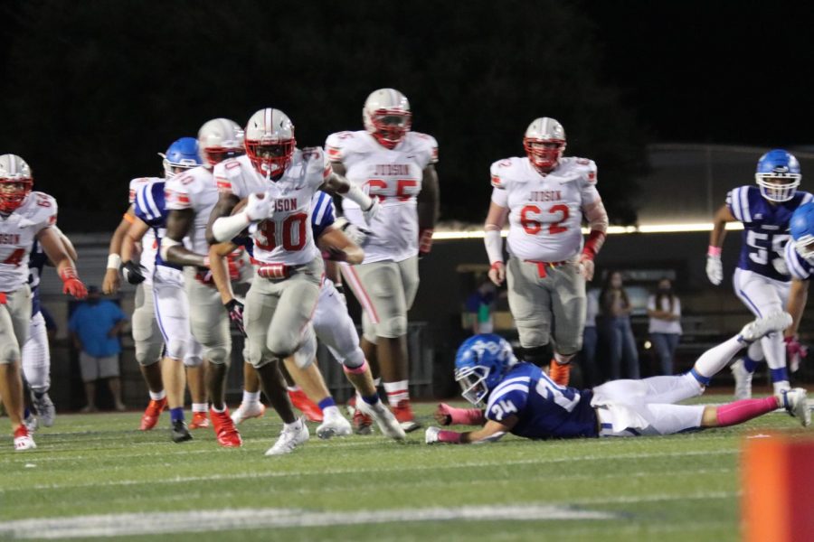 Senior DeAnthony Lewis runs in for a touchdown against the Unicorns last Friday night. The Rockets beat New Braunfels 37-14.