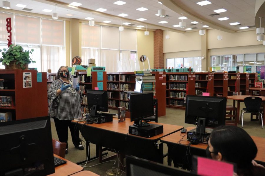 Mrs. Mariya Ortiz gives a book talk hybrid lesson to Ms. Breanna Andrews 5th period English class. This year, she has been adamant about ensuring all students still receive library support, virtually or otherwise.