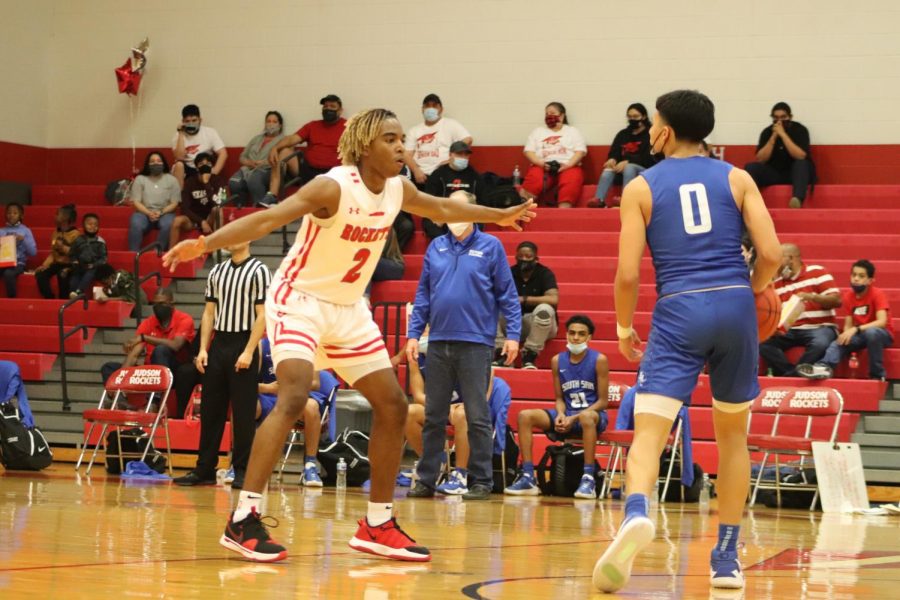 Junior Anariss Brandon blocks a Bobcat offensive player. The Rockets beat South San Antonio High School, 75-61.