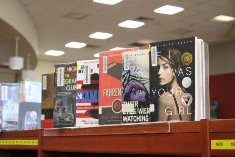 Six challenged books sit on display in the Judson High School library.