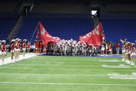Rockets launched! Judson takes the field at the Pigskin Classic.
