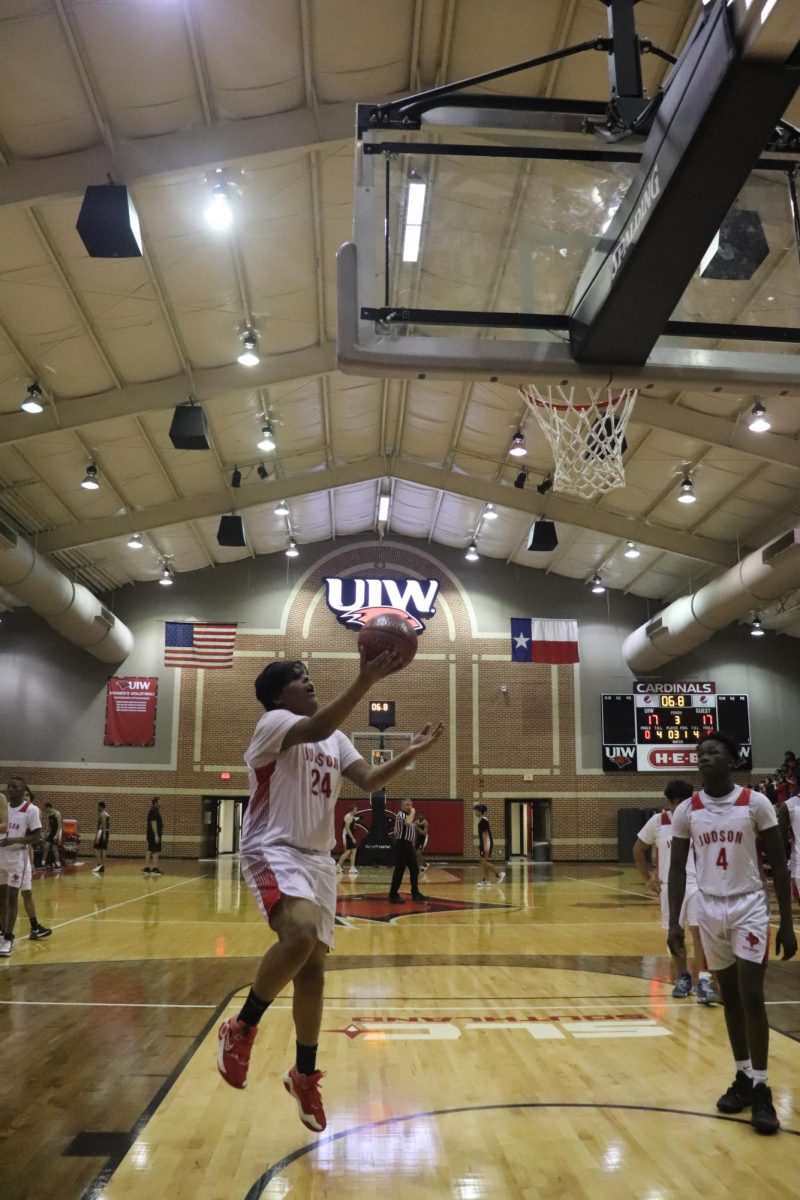 Eugene Cabello goes in for a layup during the state championship against Hutto.