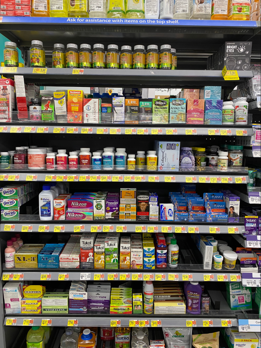 A wall full of medicine used to treat cold symptoms available at the local supermarket.