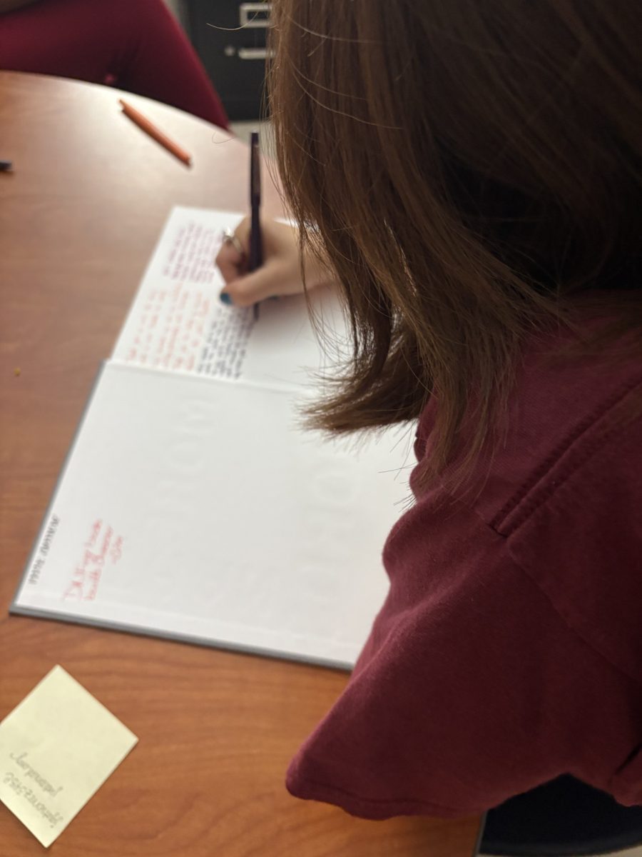 As the last weeks of school approach, students across campus share their yearbooks to be signed by friends and teachers.