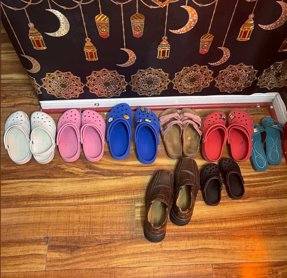 With larger families comes more personal items. The Abdi family tries to keep things tidy including everyone's shoes.